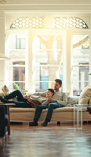 Couple on sofa in a house